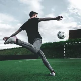 Football ball grass