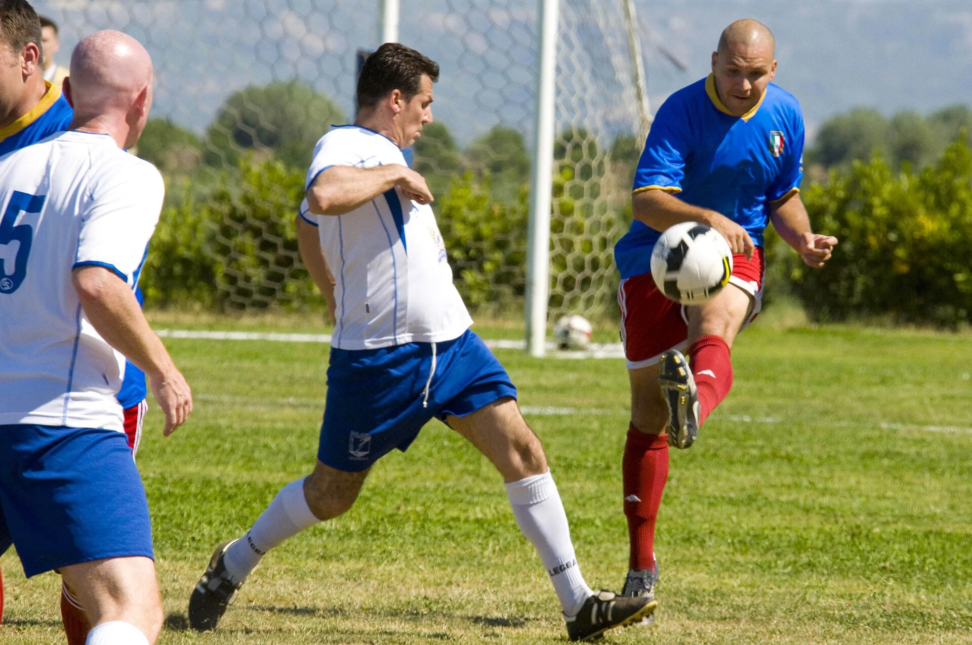 Naas AFC footballers in action