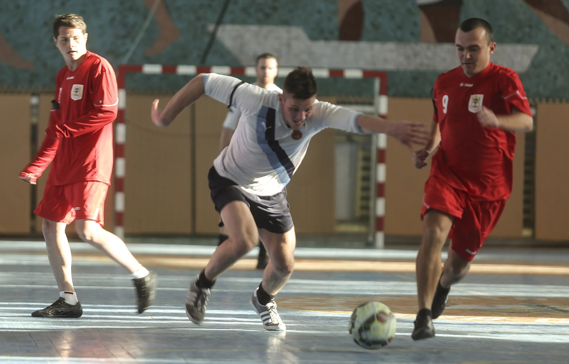 Naas AFC footballers in action